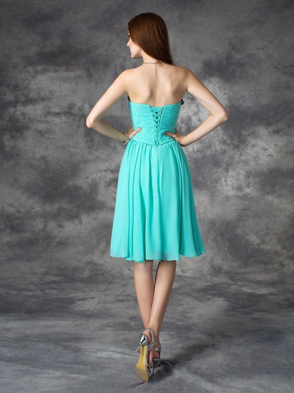 A-Line/Princess Chiffon Homecoming Dresses Rory Sweetheart Ruffles Sleeveless Short Dresses